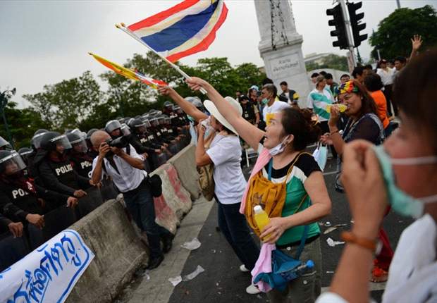 Trouble-free opening day of 2012 AFF Suzuki Cup in Thailand despite political demonstrations across the city