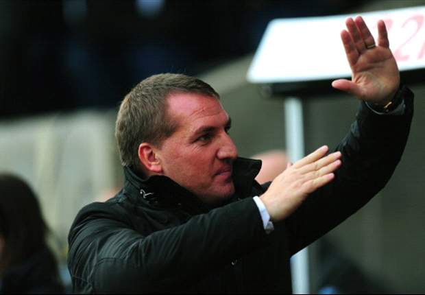 Rodgers defends Suarez after handball incident