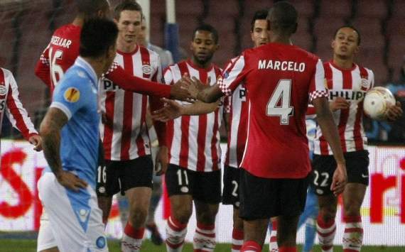 PSV Eindhoven players celebrate a goal against Napoli