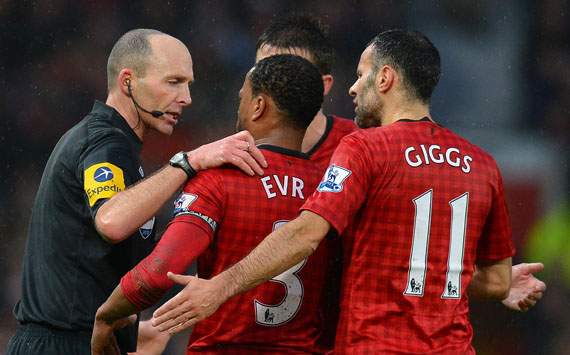 EPL - Manchester United v Newcastle United, Referee Mike Dean, Patrice Evra and Ryan Giggs