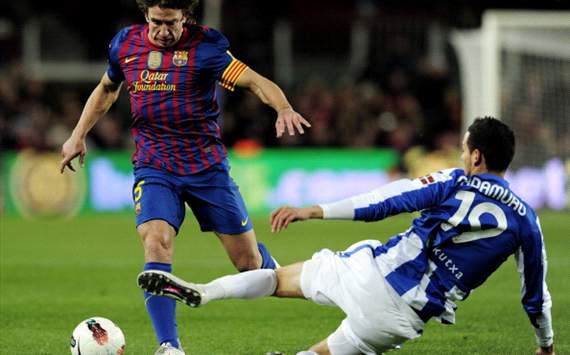 Cadamuro y Puyol, durante el Barcelona-Real Sociedad