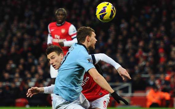 EPL - Arsenal v Manchester City, Edin Dzeko & Laurent Koscielny