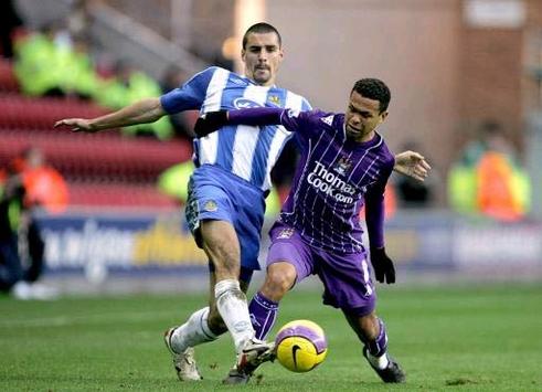 EPL: Paul Scharner - Geovanni , Wigan Athletic - Manchester City (PA)