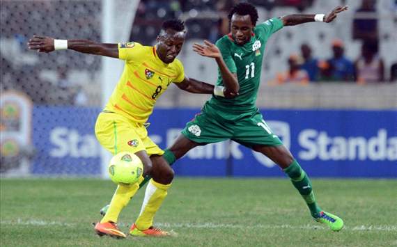 Komlan Amewou of Togo battles with Jonathan Pitroipa of Burkina Faso during the Orange Africa Cup of Nations