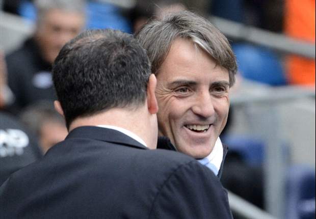 The title race is not over, insists Manchester City boss Mancini
