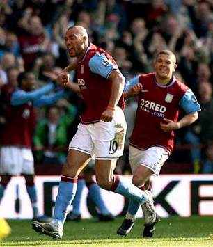 EPL: John Carew and Wilfred Bouma, Aston Villa - Newcastle United (PA)
