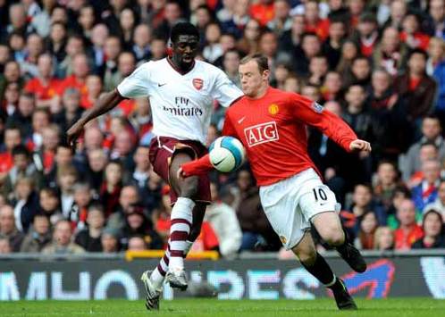 EPL: Wayne Rooney - Kolo Toure, Manchester United - Arsenal (PA)