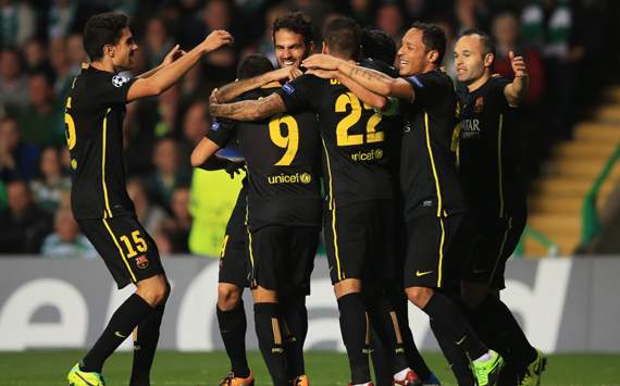 Cesc Fabregas of Barcelona celebrates with team mates