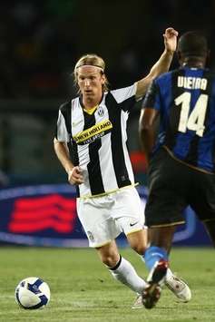 Poulsen in azione contro l'Inter nella TIM CUP  (Foto Grazia Neri)
