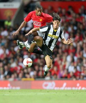 Patrice Evra - Mauro Camoranesi, Manchester United - Juventus (PA)
