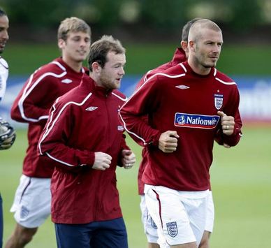 Wayne Rooney and David Beckham - England (PA)