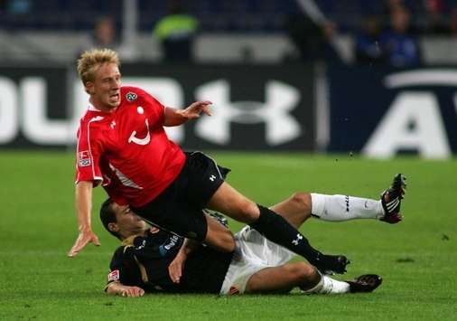 Bundesliga: Hannover 96 - Energie Cottbus, Hanke - Ziebig (firo)