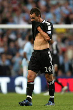 Dismissed: Chelsea captain John Terry in disbelief as his late red card against Manchester City looked set to rule him out of the clash with Manchester United. He has since successfully appealed the ban.