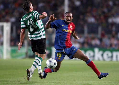 Back In Town: Sporting's Fabio Rochemback returned to Camp Nou and is pictured facing up against Seydou Keita of Barcelona in his side's 3-1 defeat to the Blaugrana.