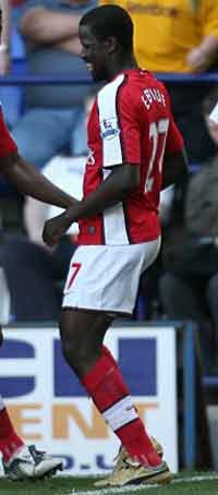 Emmanuel Eboue full of smiles, having scored his first ever Premier League goal for Arsenal in their 3-1 win over Bolton Wanderers.