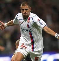 Lyon's star striker, Karim Benzema, in action against Nancy. The youngster scored the opening goal in a 2-1 win for his side.