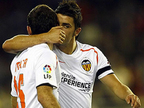 The saviours: Juan Mata and David Villa of Valencia, who between them, have been responsible for more or less all of Valencia's goals. How long can they keep it up?