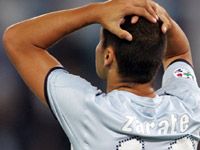 Head in hands: Lazio's Mauro Zarate having just missed a chance during his side's meeting with Torino. On the upside, they still won 3-1 and it was thanks to his two goals on the day.