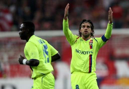 Still got it: Lyon lynchpin Juninho celebrating after his superb free-kick produced an own-goal from Bayern Munich's Martin Demichelis.