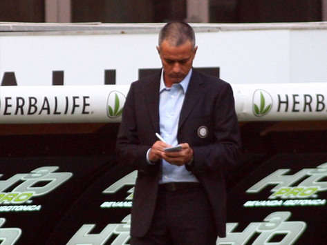 Inter manager José Mourinho makes notes during his side's goalless draw with Torino