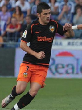 Valencia striker David Villa keeps his eye on the ball