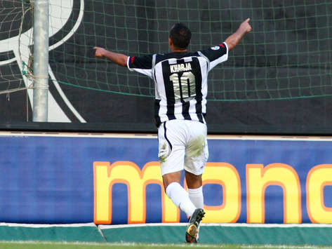 Houssine Kharja celebrates scoring the winner for Siena against Fiorentina in today's Tuscan derby.
