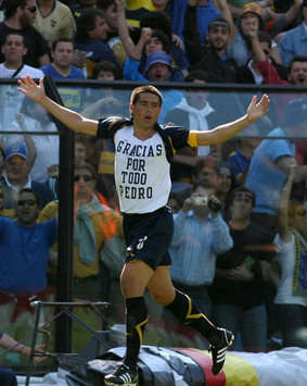 Juan Roman Riquelme celebrates a key goal for Boca Juniors
