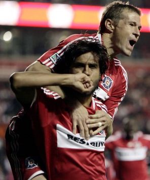 Wilman Conde celebrates scoring a Chicago Fire goal in the playoffs