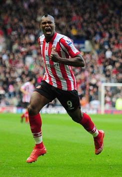 GET IN!! Djibril Cisse of Sunderland celebrates after netting a strike against Portsmouth