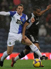 Stephen Warnock of Blackburn Rovers battles with Chelsea's Florent Malouda at Ewood Park (PA)