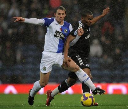 Stephen Warnock of Blackburn Rovers battles with Chelsea's Florent Malouda at Ewood Park (PA)