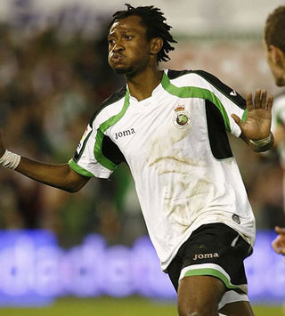 Momo Tchite, Racing-Sporting (Marca)