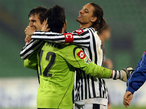Udinese's Felipe celebrated with teammates after knocking Reggina out of the Coppa Italia on penalties