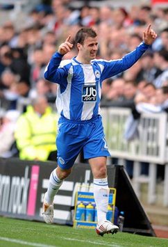 Ryan Taylor celebrates Wigan's opener against Newcastle United