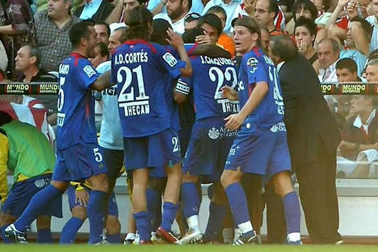 The Getafe players celebrate a goal.