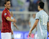 Unlucky Mate - Francesco Totti commiserates with Mauro Zarate as Roma vanquish Lazio in the Derby della Capitale Unlucky Mate - Francesco Totti commiserates with Mauro Zarate as Roma vanquish Lazio in the Derby della Capitale