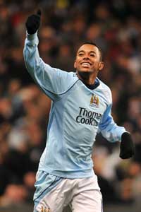 Robinho is rampant as Manchester City compound Arsenal's misery with a 3-0 romp (PA)