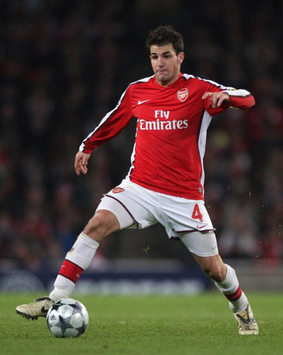 Cesc Fabregas battles Dynamo Kyiv on his debut as Arsenal captain.