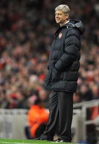 Arsene Wenger watches from the touchline as his Arsenal side claim a narrow win over Dynamo Kyiv.