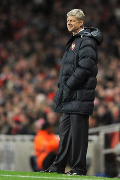 Arsene Wenger watches from the touchline as his Arsenal side claim a narrow win over Dynamo Kyiv.