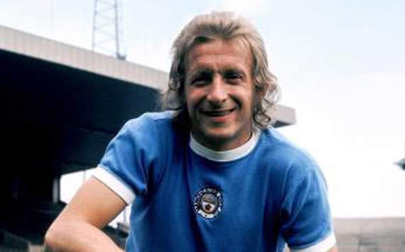 Denis Law, the Scottish former footballer who played for both Manchester City and Manchester United.