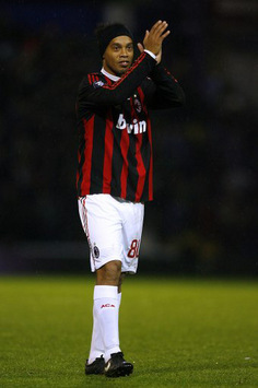 Ronaldinho applauding during AC Milan's 2-2 draw with Portsmouth in the UEFA Cup (PA)