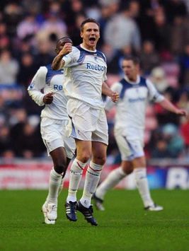 Matt Taylor celebrates his goal against Sunderland at the Stadium of Light