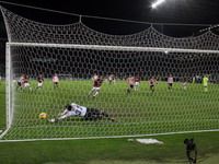 Ronaldinho's first of two spotkicks for Milan is stopped brilliantly by Palermo goalkeeper, Marco Amelia (Grazia Neri)