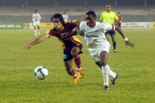 Mehrajuddin Wadoo of East Bengal And Odafa Okolie of Churchil Brothers I league match at Saltlake Stadium Kolkata (Mango Peel)
