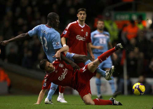EPL: Carlton Cole - Xabi Alonso, Liverpool v West Ham United (PA)