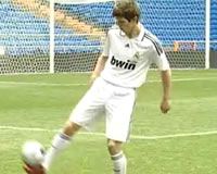 Real Madrid's new signing Klaas-Jan Huntelaar shows off to his fans during his presentation at the Santiago Bernabeu