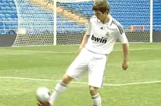 Real Madrid's new signing Klaas-Jan Huntelaar shows off to his fans during his presentation at the Santiago Bernabeu