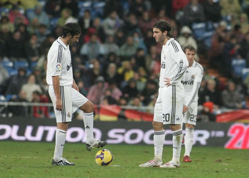 Real Madrid's dejected trio Raul, Rafael van der Vaart and Gonzalo Higuain prepare to restart the game after conceding a goal against Sevilla. Los Blancos went on to ship in four in total in a 4-3 loss (Marca)