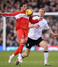 Brede Hangeland tangles with Jeremie Aliadiere as Fulham entertain Middlesbrough